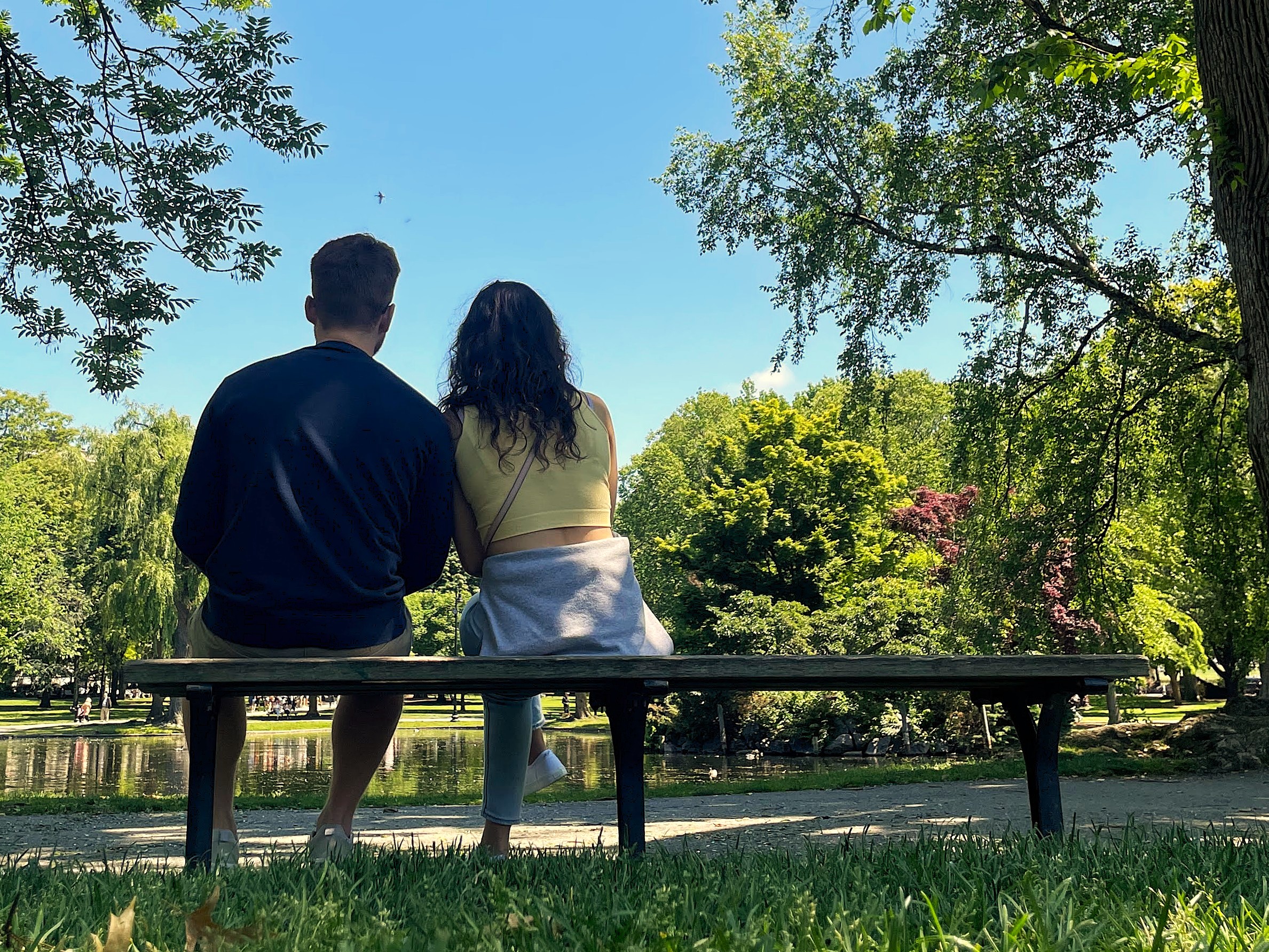 Mitchell and Kathleen sitting together on a bench