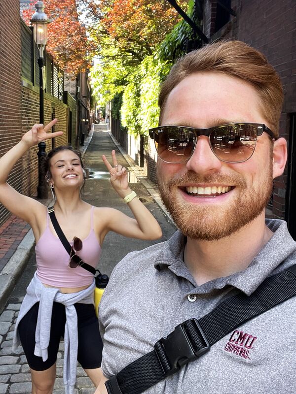 Mitchell and Kathleen walking through Boston