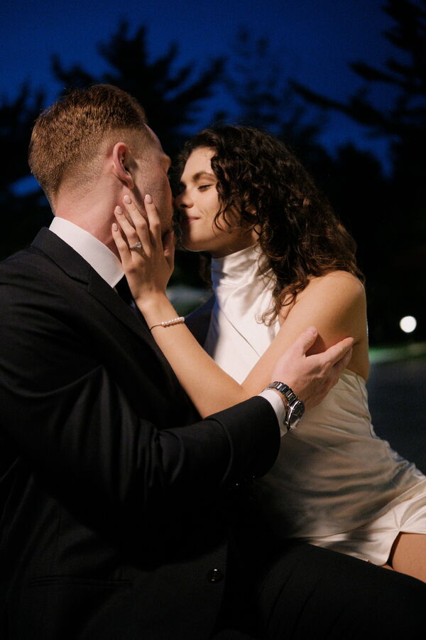 Mitchell and Kathleen together in the park for engagement portraits