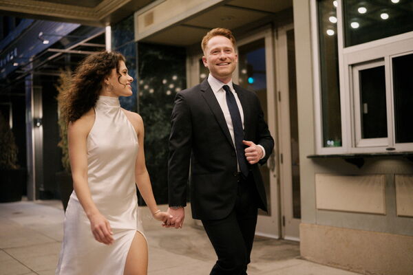 Mitchell and Kathleen sharing a laugh while walking together