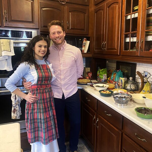 Mitchell and Kathleen making crepes together