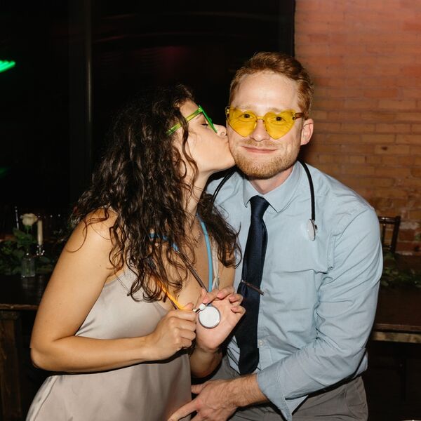 Mitchell and Kathleen sharing a heart-themed moment together